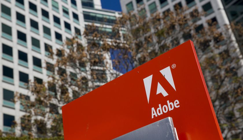 A logo sign at the headquarters of software maker Adobe Systems in San Jose, California, on December 31, 2014. Photo Credit: Kristoffer Tripplaar/ Sipa USA