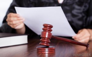 judge-holding-piece-of-paper